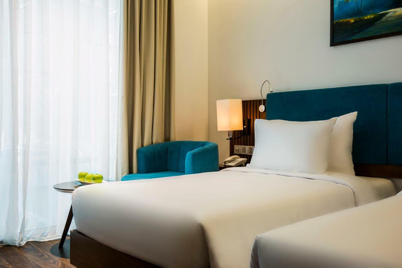 Maximilan Danang Beach Hotel Екстер'єр фото